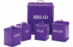 purple kitchen canisters with the words bread, sugar, and coffee printed on them