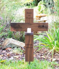 a wooden cross with the words rest in peace and mamma mary written on it