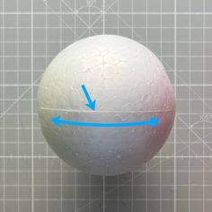 a white ball with an arrow pointing to the right