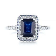 Custom Blue Sapphire and Diamond Halo Engagement Ring - Top View - 103457 - Thumbnail Classic Blue Rings With Pave Setting, Blue Diamond Ring With Pave Setting For Anniversary, Sapphire Diamond Ring With Baguette Cut, Blue Emerald Cut Cluster Ring With Center Stone, Blue Diamond Emerald-cut Cluster Ring, Wedding Sapphire Diamond Ring With Pavé Setting, Blue Diamond Promise Ring With Pave Setting, Blue Emerald Cut Diamond Ring With Halo Setting, Sapphire Colored Vvs Clarity Baguette Cut Diamond Ring