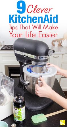 a woman is using an electric mixer on the counter