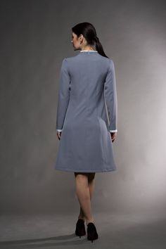 "A beautiful grey dress featuring a-line silhouette, high neck and a rhinestone embroidery. - white mandarin collar collar - a-line silhouette - midi length - long sleeves with white cuffs - rhinestone embroidery - concealed back zipper closure Color: Grey Fiber: viscose - 40%, elastane - 5%, polyester - 55% For Size S (6 US): dress length - 40\" (104 cm) You may feel free choosing the size. Just send us your measurements (bust, waist, hips, height). We will define your correct size. MORE DRESSE High Collar Dress Formal, Gray A-line Winter Dresses, Elegant Winter Dress With Stand Collar, Elegant Knee-length Gray Dress, Classic Formal Dresses With Stand Collar, Gray Knee-length Wedding Dress, Elegant Gray Knee-length Dress, Gray Midi Length Dress For Formal Occasions, Gray Midi Length Formal Dress