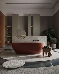 a bathroom with an oval bathtub in the middle