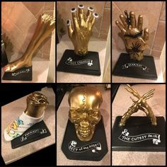 four different pictures of gold colored hand and skull sculptures on black bases with white lettering