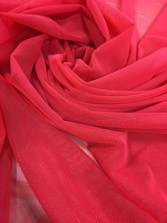 a close up view of a red scarf