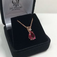 "Beautiful Ruby & White Sapphire Pendant Necklace set in 14k Rose Gold * Pear Cut Ruby measures 10x7mm * Single Brilliant Cut White Sapphire Accent measures 2.5mm * 2.7cts total Gemstone weight * 16\" or 18\" Chain Included * 14k Rose Gold Also Available in Sterling Silver or 14kt Yellow or White Gold - message me for details Hallmarked & Gift Ready! Matching Earrings & Ring Available This Ruby is laboratory grown. It is identical to natural in every way, including Chemistry, Composi Rose Gold Pear-shaped Jewelry With Prong Setting, Pear-shaped Rose Gold Jewelry With Brilliant Cut, Pear-shaped Brilliant Cut Rose Gold Jewelry, Fine Jewelry In Rose Gold With Pear-shaped Design, Fine Jewelry In Pear-shaped Rose Gold, 14k Rose Gold Pear-shaped Jewelry, Pear-shaped 14k Rose Gold Jewelry, Pear-shaped Rose Gold 14k Jewelry, Fine Rose Gold Pear-shaped Jewelry