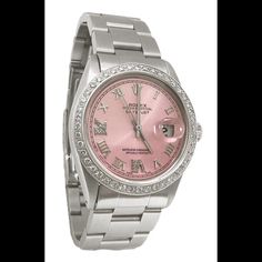 Rolex Oyster Perpetual DateJust series (Pre-owned) Gender: Men/Women Movement: Fully Automatic movement winds itself when worn-QUICK SET Case: Stainless steel oyster case Bracelet: Stainless steel oyster bracelet Dial: Pink roman dial Bezel: Approx. 2 carats F VS1 diamonds bezel (Custom added) Case Size: 36mm Movement : Quick Set Condition : Mint. Looks brand new, well polished, no scratches etc. Service : It has been fully serviced (worth value $250) and would work well for a few years before requiring service again. Wrist Size : 7.5”. Can adjust the wrist size. Extra links available for an additional cost. Packaging : Comes complete with rolex appraisal, papers, tag etc. Classic Pink Round Watch, Elegant Pink Watches With Date Indicator, Elegant Pink Watch With Date Indicator, Elegant Pink Watch With Date Display, Classic Diamond Watch With Date Display As Gift, Classic Pink Diamond Watch With Round Dial, Timeless Pink Watch With Date Indicator, Luxury Diamond Watch With Date Display, Luxury Round Jewelry And Watches With Date Display