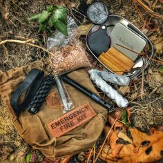 Emergency Fire Kit This TACAMO 15-Piece Emergency Fire Kit comes with all the tools and tinder you need to start or keep a fire going in an emergency. Our kit also comes in a Premium Waxed Canvas Bag for storage, that can also be used as a foraging bag! Available only from TITAN Survival! ALWAYS READY - Have you ever been caught in a bad way, with no way to make fire or create heat? Well we've got you covered with this new TACAMO Emergency Fire Kit! Or rather, you’ve got your loved ones covered! Foraging Bag, Paracord Accessories, Emergency Blankets, Mess Kit, Survival Blanket, Waxed Canvas Bag, Bushcraft Camping, Survival Shelter, Survival Tools