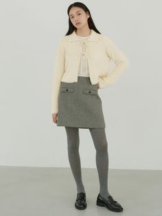 Editor's NotesThe Ladylike collection by OCTETTE showcases a modern feminine look with materials that feature a luxurious and soft touch, complemented by color schemes that highlight points of interest. It exudes a warm and cozy winter mood, embracing a modern take on feminine style- Mini skirt made of wool-blend- Classic check pattern accomodated with clean silhouette- Accented with the front pockets- Simple yet elegant design- LinedMeasurements(in.)Size: S/M- Length: 16.9 in. / 17.3 in.- Waistband width: 1.6 in. / 1.6 in.- Waist: 13.8 in. / 14.8 in.- Hip: 18.9 in. / 20.1 in.- Hem: 20.7 in. / 21.5 in.- Pocket height: 1.6 in. / 1.6 in.- Pocket width: 4.5 in. / 4.5 in.- Lining gap: 1.8 in. / 1.8 in.* Model info: height 5' 7, Bust 31, Waist 24, Hips 34Composition & Care- 65% wool, 3 Cute Work Outfits, Ladylike Style, Winter Mood, Pocket Skirt, Modern Feminine, Cozy Winter, Feminine Look, Gray Skirt, Skirts With Pockets