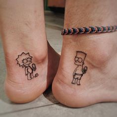 two people with matching tattoos on their feet, one has a simpsons and the other has a cat