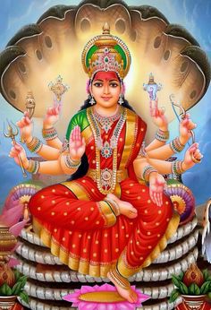 the hindu goddess sitting on top of a pot with her hands up in front of her face