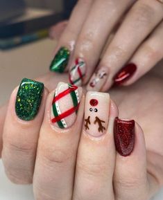 Get ready to celebrate the holiday season in style with these creative Christmas nail art designs! 🌟 From twinkling lights and snowflakes to cozy sweater patterns and festive colors, there's a design for everyone to showcase their holiday spirit. Perfect for parties, family gatherings, or just to spread some cheer! 🎅💅✨ Winter Nail Art Designs, Nail Art Noel, Snowman Nails, Christmas Nail Art Easy, Santa Nails, Red Christmas Nails, Cute Nails For Fall