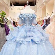 Ocean Blue Wedding Dress, Blue And Pink Sweet 16, Light Blue Evening Dress For Debutante Ball, Cinderella Themed Wedding Dress, Blue Floral Embroidered Dress For Banquet, Blue Floral Embroidery Dress For Banquet, Baby Blue Sweet 16 Dresses, Blue Dress For Spring Quinceanera, Blue Dress For Quinceanera In Spring