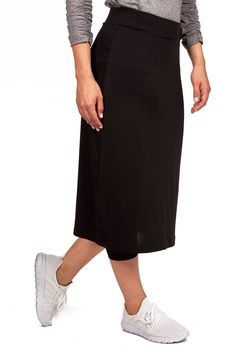 This midi-length Snoga was designed for those gals that are either tall or just want more coverage. This skirt is a soft pencil shape that is not hugging and has ¾ length attached leggings to ensure that you are covered while either doing the sport of your choice, traveling, or just running around doing errands. The material is a high performance quick drying fabric that is chlorine safe so it is suitable for water sports. You can add a t-shirt or sweater and this style can take you anywhere. We Casual Stretch Pencil Skirt, Versatile Black Capri Bottoms, Versatile Black Capri-length Bottoms, Black Knee-length Athleisure Activewear, Black Mid-calf Bottoms For Spring, Casual Solid Knee-length Activewear, Casual Knee-length Stretch Leggings, Casual Stretch Midi Bottoms, Casual Stretch Midi Length Bottoms