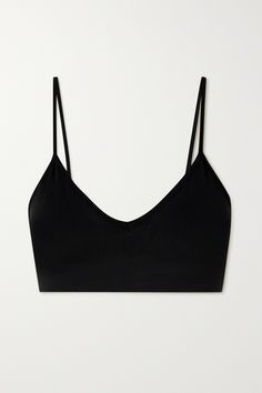 Designed to accentuate your curves, SKIMS' 'Soft Smoothing' bralette is free from padding or underwiring, making it all the more comfortable to wear. It's cut from incredibly soft stretch-nylon and has a V-neckline and wide underband for gentle lift and support whether you're lounging or completing a low-impact workout. Adjust the straps to your ideal fit. Padded Bralette, Outfit Plan, Animal Fur, Backpack For Teens, Soft Cup Bra, Closet Essentials, Black Bralette, Low Impact Workout, Bra Lingerie