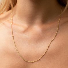 This dainty satellite chain necklace is perfect for layering and our small zodiac coin pendant. Featuring a ball sphere rolo chain in solid sterling silver or gold vermeil finish, this minimalist jewelry piece adds the perfect touch of sophistication to any outfit. The chain is adjustable and finished with a lobster clasp. ♡ ITEM SPECIFICATIONS  ------------------------------------------- ❥ 100% handmade, slowly with love and attention to detail ❥ Solid sterling silver 925/1000 or 22k gold verme Delicate Everyday Jewelry With Ball Chain, Delicate Station Necklace With Satellite Chain, Dainty Necklace With Satellite Chain, Dainty Station Necklace With Satellite Chain, Minimalist Station Necklace With Satellite Chain, Dainty Station Necklace With Satellite Chain As Gift, Dainty Sterling Silver Station Necklace With Delicate Chain, Dainty 14k Gold-filled Satellite Chain Necklace, Everyday 14k Gold Charm Necklace With Satellite Chain