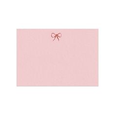 a pink card with a red bow on it