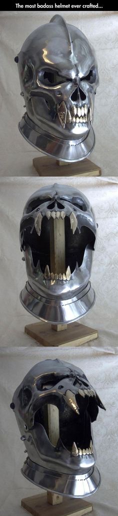 three views of a metal helmet with teeth and fangs on it's sides, from the front to the back