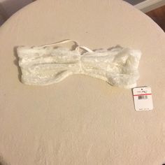 Nwt Free People White Bandeau Bra Sz Xs Great Piece For Layering Cute Crisscross In The Back If You Have Any Questions Please Ask Item Comes From A Smoke Free, Pet Friendly Home Thanks For Looking And Happy Poshing White Lace Sleeveless Tube Top, White Underwire Crop Top With Built-in Bra, White Lace Bandeau Tube Top, Fitted White Lace Tube Top, White Bra Friendly Tube Top, White Sleeveless Bra-friendly Tube Top, Lace Trim Bandeau Crop Top, White Strapless Bra For Summer, White Strapless Summer Bra