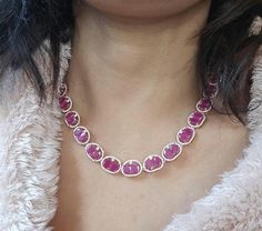 Elevate your style with our Rose Gold Diamond and Ruby Necklace Set. Featuring stunning red rubies and sparkling diamonds, this Indian-inspired jewelry is perfect for special occasions or glamorous nights out. Ideal for Bollywood lovers and cocktail parties, it's a unique addition to any collection. Shop now to make a statement! Our products are meticulously handcrafted, ensuring each piece is unique. Due to the manual craftsmanship, you may notice slight irregularities, which are natural and do not compromise the quality of the jewelry. Pink Ruby Necklace For Party, Ruby Necklace Set, Indian Inspired Jewelry, Indian Necklace Set, Ruby Diamond Necklace, Ruby Set, Necklace Set Indian, Cocktail Jewelry, Indian Necklace