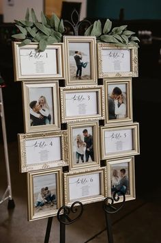 a wedding photo display with pictures and greenery on it's easel for the guests to take photos