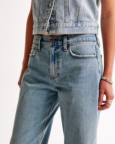 Embrace the nostalgia of the 90s with Abercrombie & Fitch's Women's Low Rise Baggy Jeans in Medium Tinted. Perfect for those who love a retro vibe, these jeans are a must-have for your casual wardrobe.

- Size: 30 SHORT
- Color: Medium Tinted
- Material: Pocket Bag - Polyester, Cotton Blend
- Gender: Female
- Fit: Low rise, 8.5” rise; relaxed at waist and hips; baggy, full-length leg
- Fabric: Vintage stretch for comfort and an authentic look

These jeans offer a versatile baggy fit that can be Classic Flare Jeans With Frayed Hem For Everyday, Everyday Medium Wash Cutoff Flare Jeans, Classic Mid-rise Faded Flare Jeans, Classic Faded Mid-rise Flare Jeans, Light Wash Cropped Bottoms For Everyday, Washed Cropped Leg Flare Jeans For Everyday, Everyday Light Wash Cropped Bottoms, Classic Medium Wash Flare Jeans For Summer, Classic Mid-rise Cropped Jeans In Faded Color