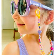 Decorate your glasses with this super cute Gummy Bear Chain. Perfect for: vision glasses, sunglasses, and masks. This chain is long enough for both kids and adults to wear. Fun Plastic Jewelry For The Beach, Adjustable Fun Beaded Chain Jewelry, Fun Adjustable Beaded Chain Jewelry, Trendy Summer Plastic Jewelry, Trendy Adjustable Glasses Chains, Playful Plastic Jewelry For The Beach, Trendy Adjustable Glasses Chains For Party, Trendy Purple Plastic Jewelry, Playful Plastic Beach Jewelry