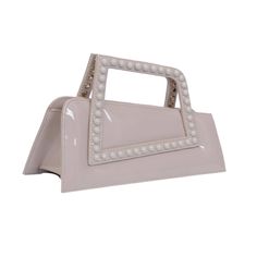 DescriptionCrafted in Egypt from high quality leather. The Jalila Bag features an odd geometrical asymmetrical rectangle shape with asymmetrical square Top Handle embellished with studs. Equipped with a detachable gold chain strap, this accessory can be worn as a cross-body or carried by hand. MaterialFabric : Faux LeatherFinishing : PatentThickness: 1.1-1.4 mmClosure Type: Magnetic ClosureHandle: Asymmetrical Top HandleExterior: Solid Interior: VelvetType: Top HandleOptional: Detachable Gold Ch Word Meaning, Square Top, Beige Top, Asymmetrical Tops, Stand Tall, Proud Of You, Handle Bag, Rectangle Shape, High Quality Leather