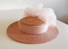 Handmade from tiny ribbons of straw and extremely lightweight, this unique Edwardian style hat is a perfect summer accessory both for formal and casual occasions. Available in old rose (as seen in the photos), red, fuchsia pink, cerise, jade green and royal blue. Diameter: cca 33cm Depth of the head part : cca 5 cm Bohemian Straw Hat For Spring Party, Spring Boater Hat With Ribbon And Flat Brim, Handmade Pink Straw Hat For Summer, Kentucky Derby Boater Hat With Ribbon, Kentucky Derby Boater Hat With Ribbon For Garden Party, Elegant Woven Boater Hat For Kentucky Derby, Vintage Straw Hat For Summer Evenings, Handmade Straw Hat For Spring Party, Straw Hats For Spring Weddings