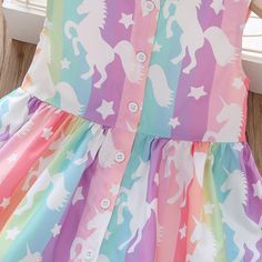 *Product Title:Toddler Girl Unicorn Print Dress*Keyword Tag:kids loungewear wholesale*Fabric:Polyester*For Season:Summer*Thickness:Regular*Care Label:On the inside Princess Style Rainbow Dress With Unicorn Print, Rainbow Princess Dress With Unicorn Print, Playful Rainbow Print Summer Dress, Summer Cartoon Print Dress For Sleepover, Pink Sleeveless Dress With Unicorn Print, Playful Pink Unicorn Print Dress, Sleeveless Unicorn Print Dress For Spring, Cute Pink Dresses With Cartoon Print, Cute White Unicorn Print Dress