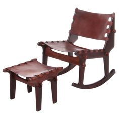 a wooden rocking chair and footstool with leather seat cushion on the bottom half