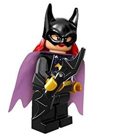 the lego batman movie character is dressed in black and purple, with a bat on his chest