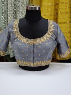 Fancy raw silk blouse with gold embroidery Blouse has 2 inch margins on each side to make it bigger Ready to ship Online only Anarkali Embroidered Wedding Blouse, Gold Embroidered Raw Silk Fabric For Reception, Traditional Embroidered Wedding Blouse, Semi-stitched Gold Embroidered Fabric, Brocade Traditional Wear With Gold Embroidery For Festivals, Festive Brocade Traditional Wear With Gold Embroidery, Festival Traditional Wear With Gold Embroidery And Brocade, Semi-stitched Blouse With Intricate Embroidery For Navratri, Gold Embroidered Art Silk Fabric For Designer Wear