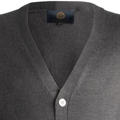 This button front cardigan is made with the finest 100% Baruffa merino wool, and features a classic look that is always in style. 100% extra fine Merino wool 5 button placket Long sleeves Two front pockets Ribbed cuffs and bottom The extra fine Merino wool used to make this sweater was produced at the famous Baruffa Lane Borgosesia wool mill in Italy. It is a fibre of outstanding quality selected from the best producers in Australia and spun by Baruffa. It is lightweight, as delicate as silk, an Classic Winter Cardigan For Business, Classic Cashmere Cardigan For Formal Occasions, Classic Fitted V-neck Sweater, Luxury V-neck Outerwear With Button Closure, Classic Gray Sweater For Workwear, Classic Formal Cardigan With Buttons, Winter Business Cardigan With Buttons, Business Winter Cardigan With Button Closure, Classic V-neck Outerwear For Business