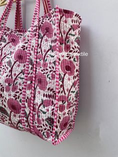 cotton print Bag The Indian Hand Block Printed Cotton Quilted Women's Handbags from Rajasthan India. This Handbag is completely Indian Printed on good quality cotton. Cotton quilted Jhola Bag made by Indian Artisans, this cotton quilted shopping bag is totally unique and multi purpose. Use this for your grocery or as a travel bag. Perfect to suit all. Item :- Cotton Handbag Material: Quilted Cotton Fabric Color - rainbow Pattern : Block Print Style: Tote Bag, Handle Bag, Shoulder Bag Size in Inch:- Height-18" inch Width- 19" inch Handle-13" inch Product Work: Printed & quilted Stitched Usage : Cosmetic, Make-up, Travel, Toiletries, Medicine, Accessories, Shopping and much more. Perfect for Beach Visits/ Quick Grocery runs/ Carrying Kids items/ Artist Paint book and Paints /Extra Bag Washab Multicolor Cotton Shoulder Bag For Everyday Use, Pink Cotton Beach Bag For Daily Use, Everyday Multicolor Cotton Shoulder Bag, Pink Reversible Shoulder Bag For Daily Use, Reversible Cotton Canvas Bag For Daily Use, Eco-friendly Pink Cotton Beach Bag, Multicolor Cotton Beach Bag For Everyday, Multicolor Cotton Everyday Beach Bag, Multicolor Cotton Beach Bag