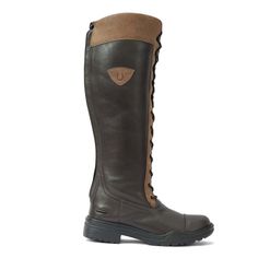 TuffRider footwear has added the Raj Ladies Muck Tall Boot to its ever growing collection. The meticulously handcrafted boot made with Cyprus Brazilian leather for the softest and finest feeling also showcases unmatched longevity. The skin-fit lining with foam lamination ensures a snug but breathable fit, while the large Italian YKK #10 zipper provides a smooth glide even when wet or covered in snow. This tall boot offers a double layer, waterproof rubber sole that guarantees protection from the Brown Round Toe Riding Boots, Brown Round Toe Work Boots For Riding, Brown Snip Toe Riding Boots, Rugged Riding Boots With Round Toe, Rugged Round Toe Riding Boots, Leather Sole Round Toe Boots For Shows, Brown Riding Boots For Winter, Winter Riding Boots In Brown, Winter Riding Boots With Leather Lining