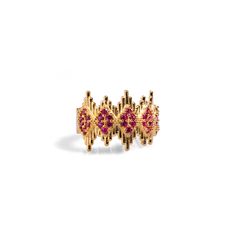 Ruby Stone & Gold Crown Adjustable Statement Ring, a luxurious and elegant piece designed to add a touch of royalty to your style. Crafted from 24k gold-plated brass, this stunning ring features geometric crown-like lines adorned with delicate ruby stones, creating a refined yet striking effect. The intricate design captures a regal aesthetic, making it both a sophisticated and eye-catching accessory. With its adjustable band, this ring offers versatility and comfort, making it perfect for any occasion Details Crafted with high-quality brass and plated with 24k gold for a luxurious finish. Ruby stone Adjustable size Avoid contact with chemicals, makeup, perfume. Do not use dips or abrasive cleaners on ring. To clean and brighten it up your ring, wipe them gently with jewelry polishing clot Yellow Gold Jeweled Rings As Gifts, Yellow Gold Rings With Jewels For Gift, Regal Gold Jewelry For Ceremonies, Yellow Gold Temple Jewelry Rings For Formal Events, Luxury Gold-tone Brass Rings, Luxury 22k Gold Ring Jewelry, Formal Yellow Gold Temple Jewelry Rings, Luxury Gold-plated Gold-tone Ring, Formal Gold Rings With Ruby