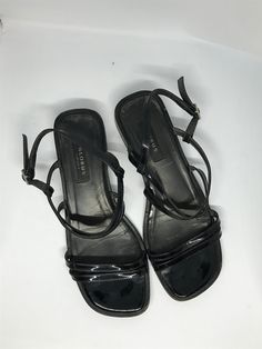 Black vintage 80s summer sandals made by Globus shoes in Italy. Made of leather with varnished top. Size - 37 1\2. Good condition. *med square toe *thin straps *double straps *crossed straps *buckle *low wide heels Please check measurements carefully. Compare them to your shoes to know if it fits.  Every item is cleaned and ready for wearing.  Measurements Length: 10" 25 cm Width: 3  1\2" 9 cm Heel: 1" 2,5 cm  Text me if you have any questions.  Thanks for stopping by :) Vintage Sandals, Wide Heels, Pretty Shirts, Italian Shoes, Gifts For My Wife, Summer Sandals, Black Vintage, Vintage Shoes, Sandals Summer