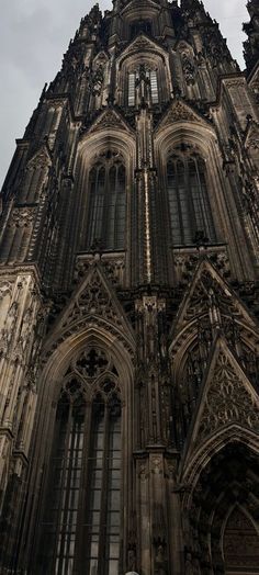 the top of an old building with many windows