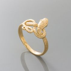 14k Yellow Gold Snake Band Ring, Engraved (Size 7) Image Enlarged To Show Detail. Weight/Sizes Approximate Made In The U.S.A. Snake Ring Band To Order With Gift Box, Select Gift Wrap Option During Checkout 2.5 Grams Total Metal Weight. Band Measures 2.18mm Wide X .73mm Thick At The Thinnest Point. Snake Measures 13.75mm From Head To Tail. Ring Size 7 Mcqgk4541 Classic Gold Snake Ring Gift, Elegant Gold Snake Ring Stamped 14k, Luxury Gold Snake Ring For Anniversary, Formal Gold Snake Ring In Fine Jewelry Style, Formal 14k Gold Snake Ring Fine Jewelry, Formal 14k Gold Snake Ring, Hallmarked Gold Snake Ring For Anniversary, Gold Hallmarked Snake Ring For Anniversary, Sterling Silver Snake Ring In Yellow Gold For Anniversary