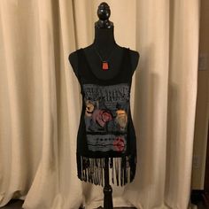 Unique Fringed Shirt With Lots Of Bling! Size L. Never Worn. Necklace Not Included. Casual Black Fringe Tops, Black Bohemian Tops With Fringe, Bohemian Black Tops With Fringe, Fitted Casual Tank Top With Fringe, Sleeveless Black Top With Fringe, Casual Fitted Fringe Tank Top, Casual Fringe Tank Top For Festivals, Fringed Shirt, Fringe Shirt