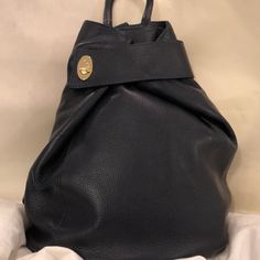 Stylish Handbag Backpack All Leather Deep Navy, Could Serve As Black As Well Gold Tone Hardware Zipper Closure With Additional Toggle Wrap At Top Adjustable Leather Back Straps Hand Carry As Well 4” Drop Zipper Phone Pocket On Back For Added Security Interior Has Zipper Pocket And Slip Pocket Roomy Inside Purchased At A Boutique - No Brand Name On Bag Generic Dust Bag Included Nwt Excellent Condition Designer Tote Backpack For Everyday Use, Designer Everyday Backpack Tote, Designer Everyday Tote Backpack, Designer Everyday Standard Backpack, Designer Leather Shoulder Backpack, Luxury Backpack With Double Handle For Daily Use, Designer Shoulder Bag Standard Backpack For Everyday Use, Designer Shoulder Bag As Standard Backpack For Everyday Use, Designer Backpack For Everyday Use