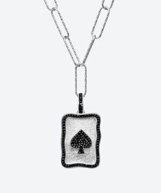 Feeling lucky in cards? Whether you play Poker, Black Jack, Rummy, Bridge, Pinochle, Canasta, Cribbage or Solitaire this hand crafted brilliant modern charm necklace will definitely give you a wining edge. Get ready to receive many compliments! Medallions are gorgeous and brilliant statement pieces. Individually handcrafted with hand-set Swarovski crystals on rich textures in 24k Gold over Sterling Silver solid core, by fine jewelers. Medallions boast a hidden clasp for easy clip on/off flexibility. Enjoy designing your personalized necklace expression by adding charms using our "Build your Own Charm Expression" design app. Total Weight is approximately 15.7 grams, Medallion: 7grams Pendant dimensions: 1" x .8" Pendant has a clip for easy removal Clip length: .4" Swarovski™ crystal .925 St Card Playing, Feeling Lucky, Black Jack, Solid Core, Design App, Medallion Necklace, Fine Jewels, Jack Black, Gold Dipped