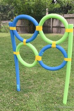 an inflatable ring toss game on the grass