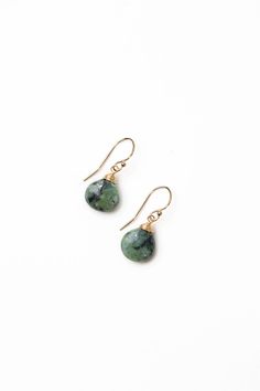 The perfect dangle earrings for the Tranquil Gardens Collection. This artisan design rests at approximately 1" from gold filled ear wires. Matte Gold Plated Brass (nickel and lead-safe) African Turquoise 1", with gold filled ear wires We hand select our natural materials, thus there may be slight variations in color and/or size that will not detract from the overall aesthetic Our unique handcrafted designer jewelry for women is made in America, each design created individually in our personal de Everyday Green Lever Back Earrings, Teardrop Jewelry With French Hook For Gifts, Teardrop French Hook Jewelry For Gifts, Teardrop French Hook Jewelry As A Gift, Teardrop May Birthstone Earrings With Ear Wire, May Birthstone Teardrop Earrings With Ear Wire, Artisan Teardrop Earrings With Lever Back Ear Wires, May Birthstone Drop Earrings With Ear Wire, Artisan Drop Earrings With Lever Back Ear Wires