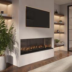 a living room with a large television mounted on the wall and a fire place in front of it