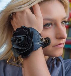 Leather Rose Cuff from Delicious Boutique Leather Cuff Diy, Fabric Cuff Bracelets Diy, Diy Leather Flowers, Leather Cuff Bracelet Diy, Inuit Clothing, Cuff Bracelets Diy, Fabric Cuff Bracelet, Leather Jewelry Making, Diy Leather Bracelet