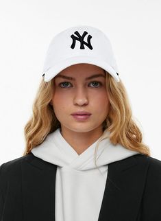 Classic White Cotton Baseball Cap, College Baseball Cap With Embroidered Logo, White Cotton Trucker Hat With Embroidered Logo, White Cotton Baseball Cap With Embroidered Logo, Sporty Baseball Cap With Curved Visor For College, Trendy White Baseball Cap With Embroidered Logo, White Baseball Cap With Embroidered Logo, Adjustable Fit, Sporty Snapback Hat With Embroidered Logo And Curved Visor, White Adjustable Baseball Cap With Embroidered Logo