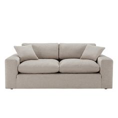 an image of a couch with pillows on the top and bottom part of it, in front of a white background