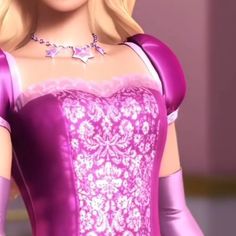 the barbie doll is wearing a purple dress